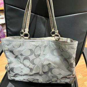Grey coach purse with purple inside